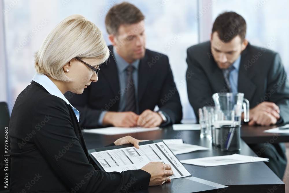 Professional checking documents at meeting Professional checking documents at meeting
