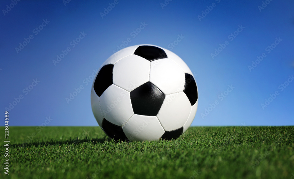 Photo of a soccer ball on grass