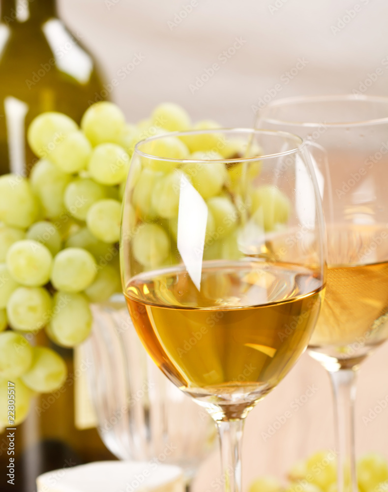 Still-life with bunch of grapes and white wine Still-life with bunch of grapes and white wine