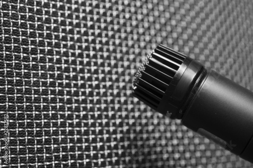 Microphone closeup against speaker