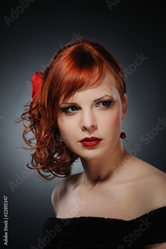 Portrait of an attractive redhead woman