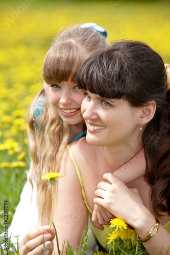 Mother with daughter in outdoor. photo