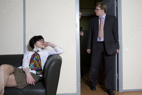 Colleagues struggle in door for chance be first in boss`s office © elenarostunova