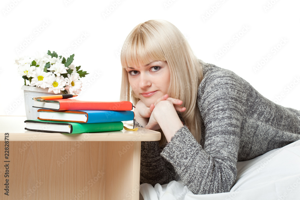 woman in sweater near books woman in sweater near books