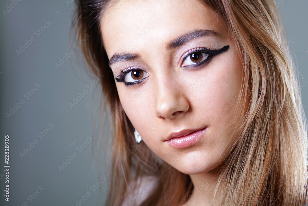 Naklejka premium Portrait of the sad model with beautiful hair