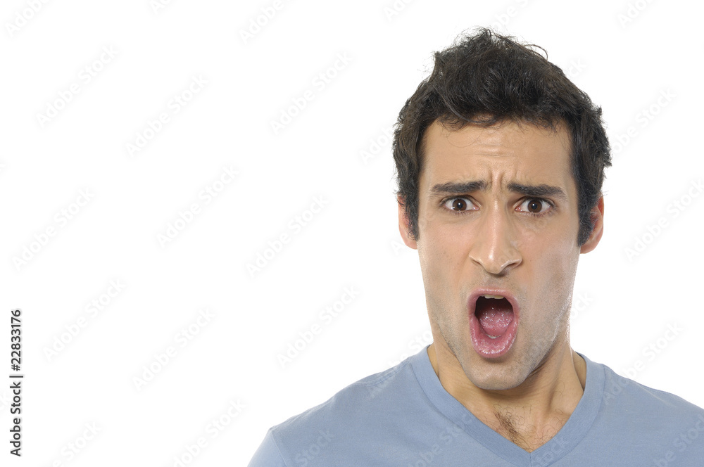 Close up young man with an exaggerated sad face Close up young man with an exaggerated sad face