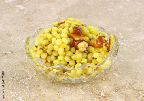 Small bowl of couscous with cranberries photo