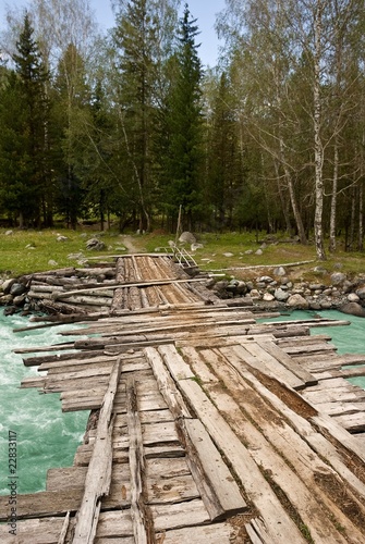 wooden bridge on a river