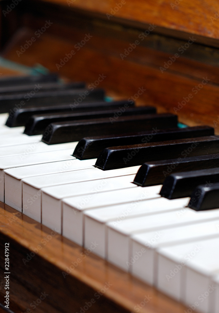old wood piano with white and black keys old wood piano with white and black keys