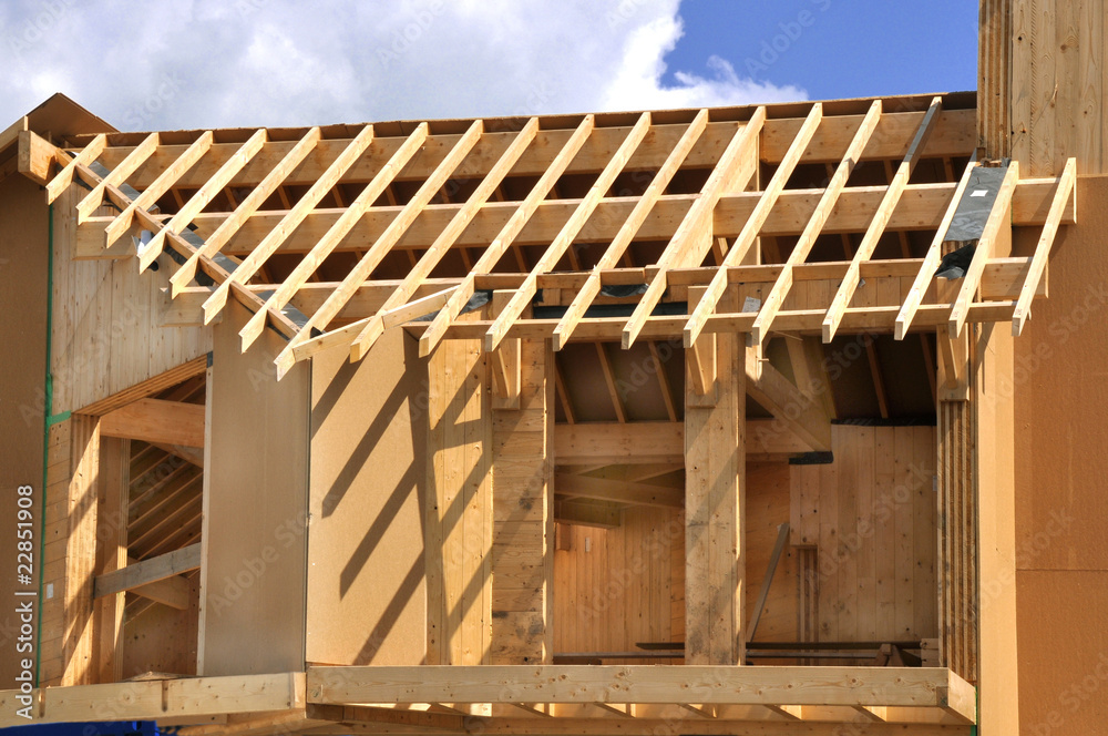 ossature de maison en bois en construction