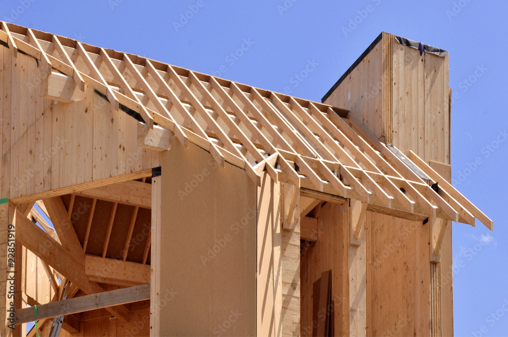 ossature de maison en bois en construction