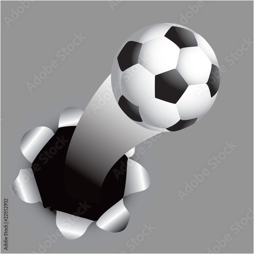 soccer ball coming out of hole