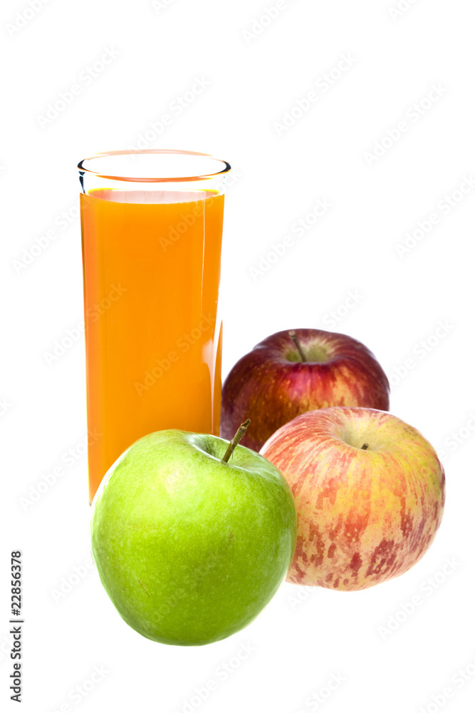 Apples and juice in glass Apples and juice in glass