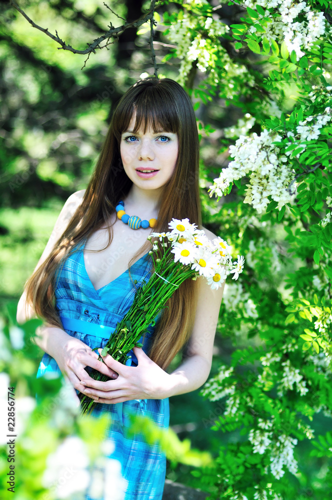 tender girl with daisies