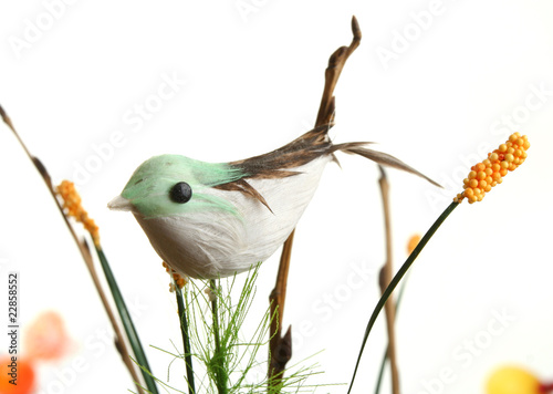 Decorative bird on branch