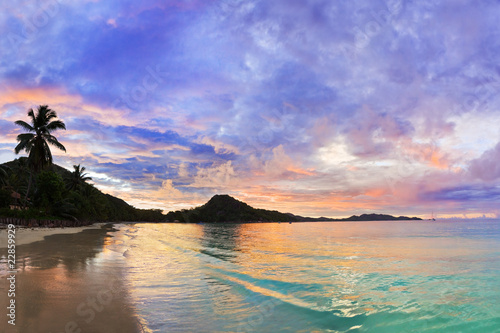 Tropical beach Cote d'Or at sunset, Seychelles photo