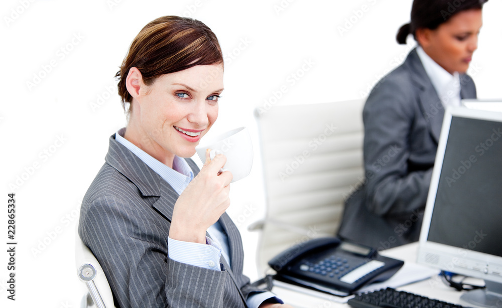 Relaxed businesswoman partners having a break drinking coffee Relaxed businesswoman partners having a break drinking coffee