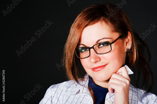 Young beautiful charming girl in white blouse