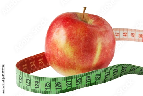 Diet concept. Apple with measure tape isolated