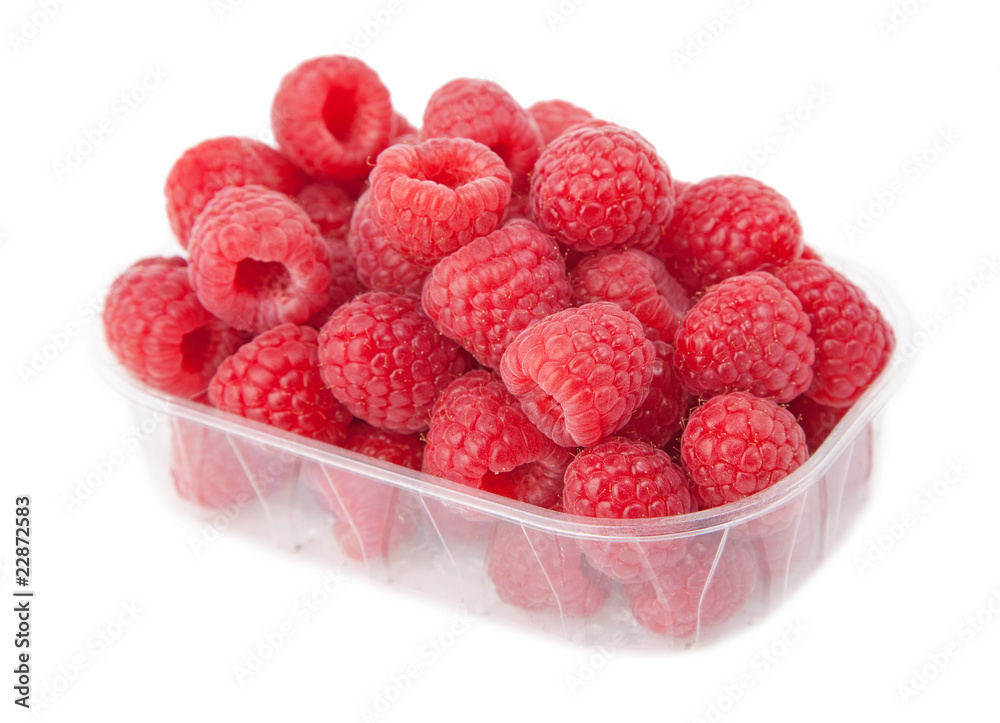 a lot of fresh raspberries. isolated on white. a lot of fresh raspberries. isolated on white.