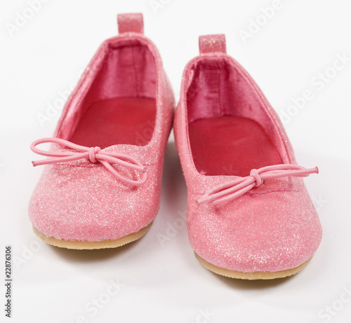 Princess slippers on white background.