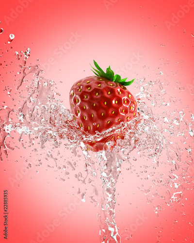 fresh strawberries in a spray of water