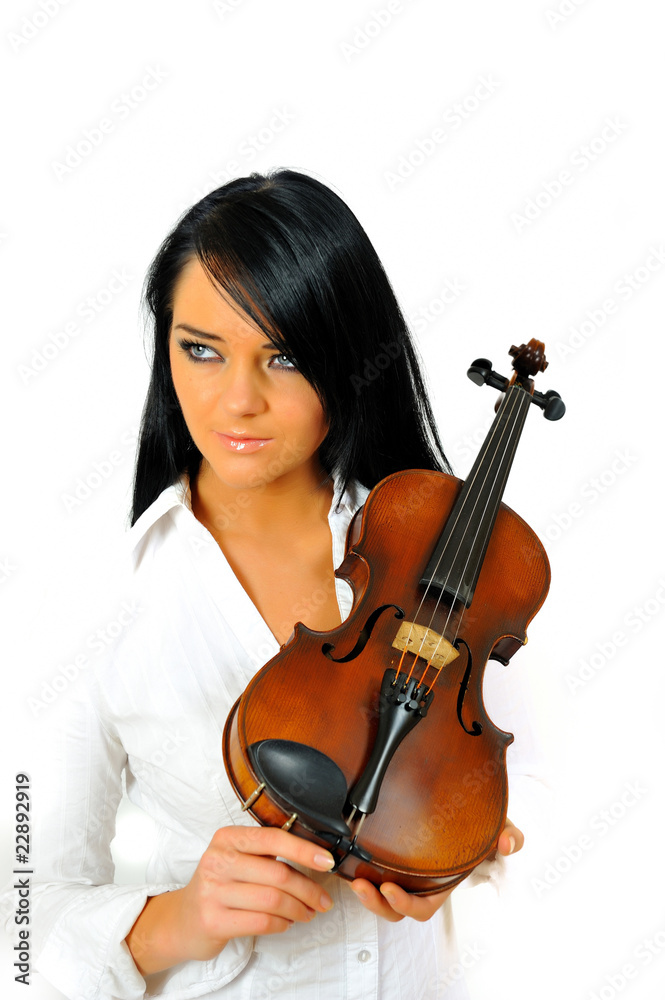 Young beautiful woman with violin. isolated on white background Young beautiful woman with violin. isolated on white background