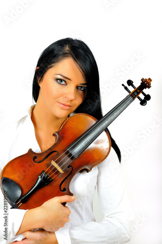 Young beautiful woman with violin. isolated on white background