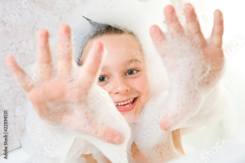 Small child in bath photo