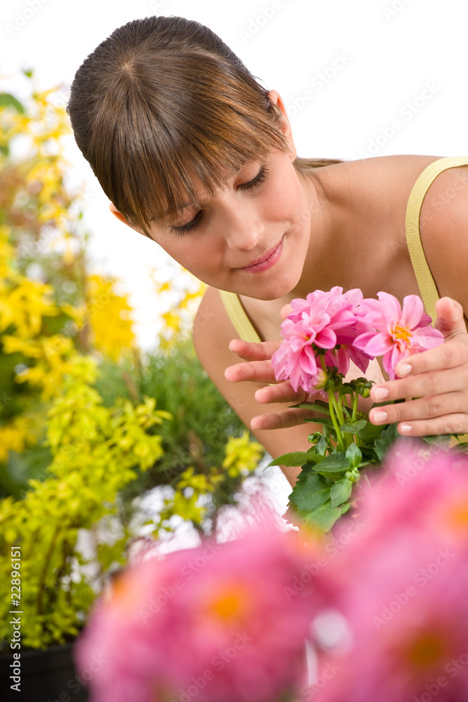 Gardening - smiling woman with flower