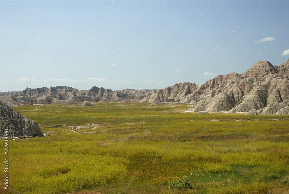 Naklejka premium Prairie meeting Badlands rock formations, Badlands NP, SD