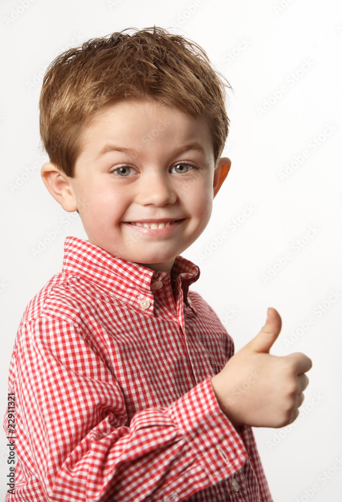 young boy with thumb up young boy with thumb up