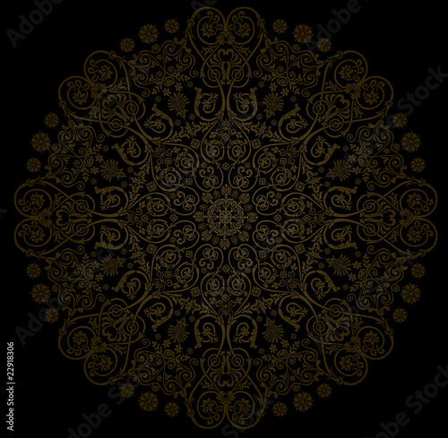brown round decoration on black