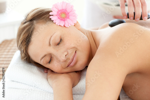 Portrait of a sleeping woman having a flower