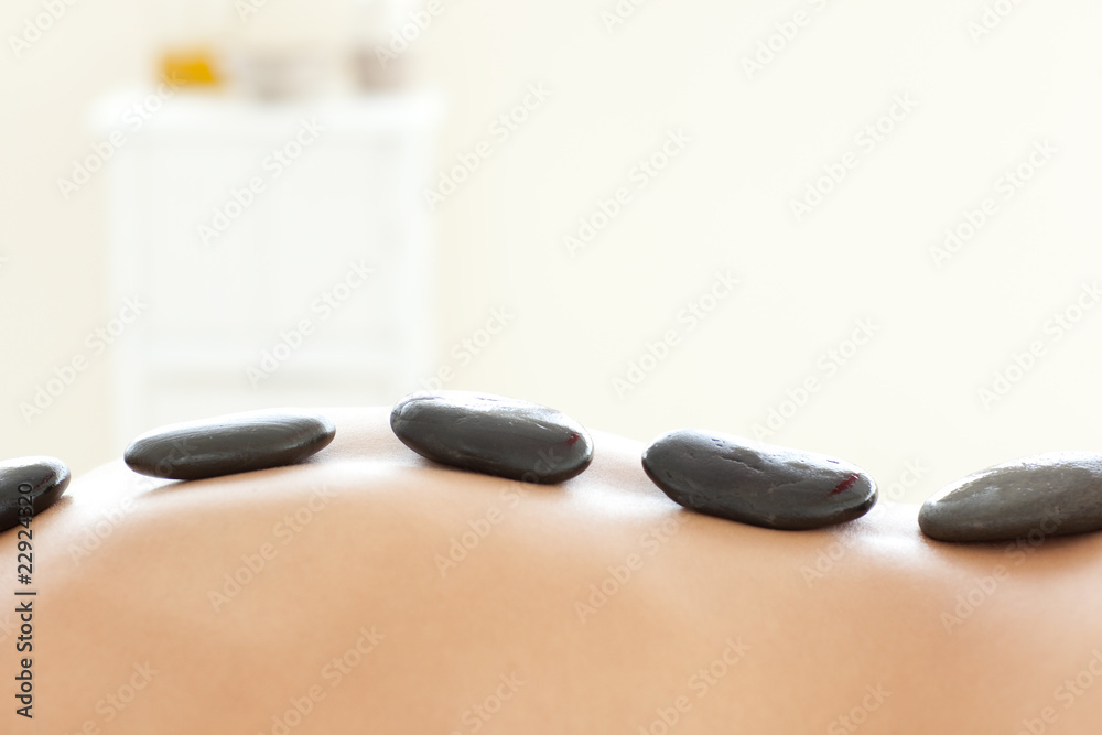 Naklejka Caucasian woman lying on a massage table