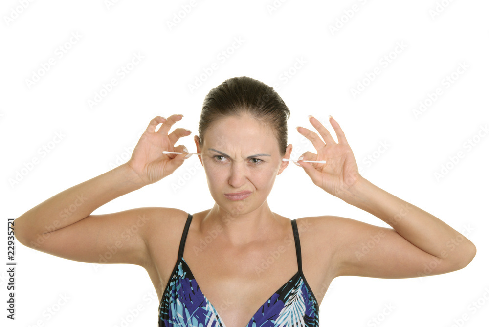 Woman cleans ears two cotton buds Woman cleans ears two cotton buds