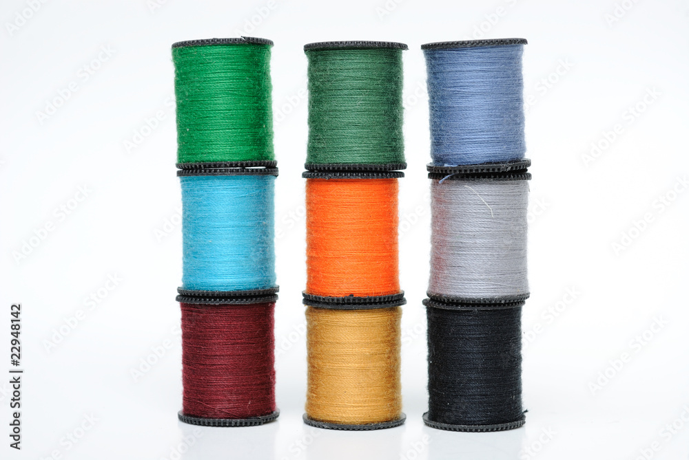 Colorful Spools of Thread Stacked Colorful Spools of Thread Stacked