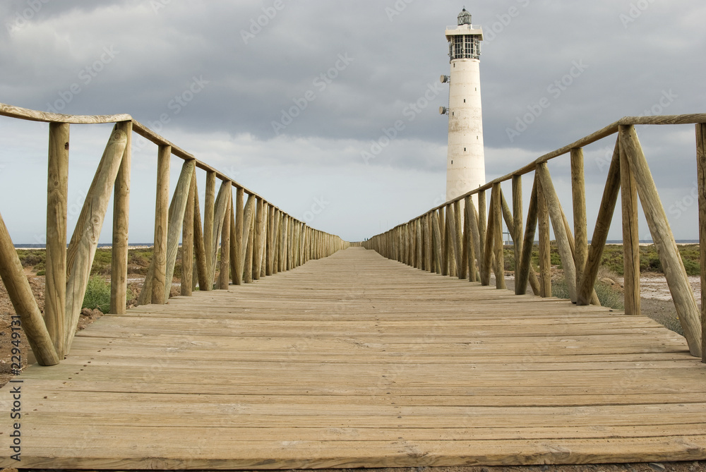 Lighthouse with  wooden footbridge. Fuerteventura