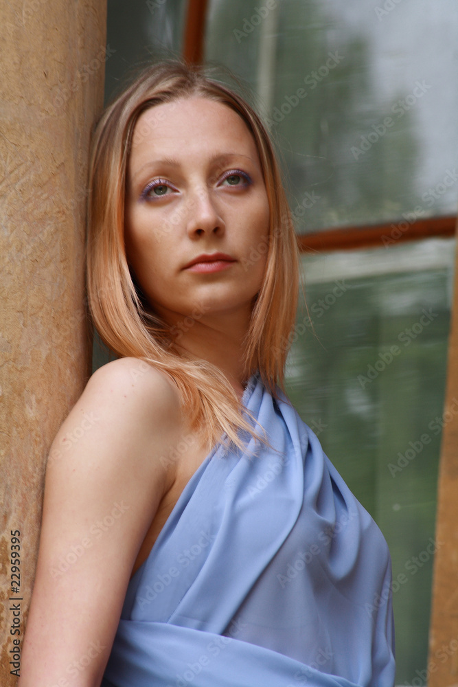Fototapeta premium portrait beautiful blonde in blue tunic