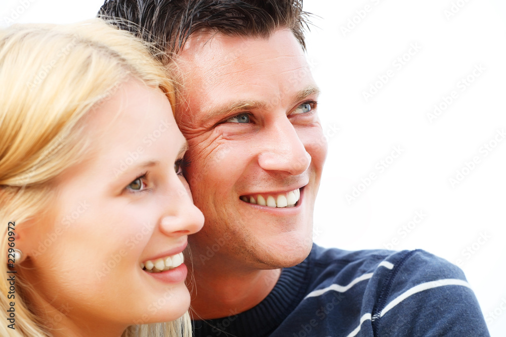 Close-up portrait of a young happy couple. Shallow DoF. Close-up portrait of a young happy couple. Shallow DoF.