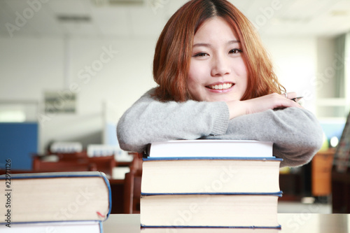 asian girl studying in library