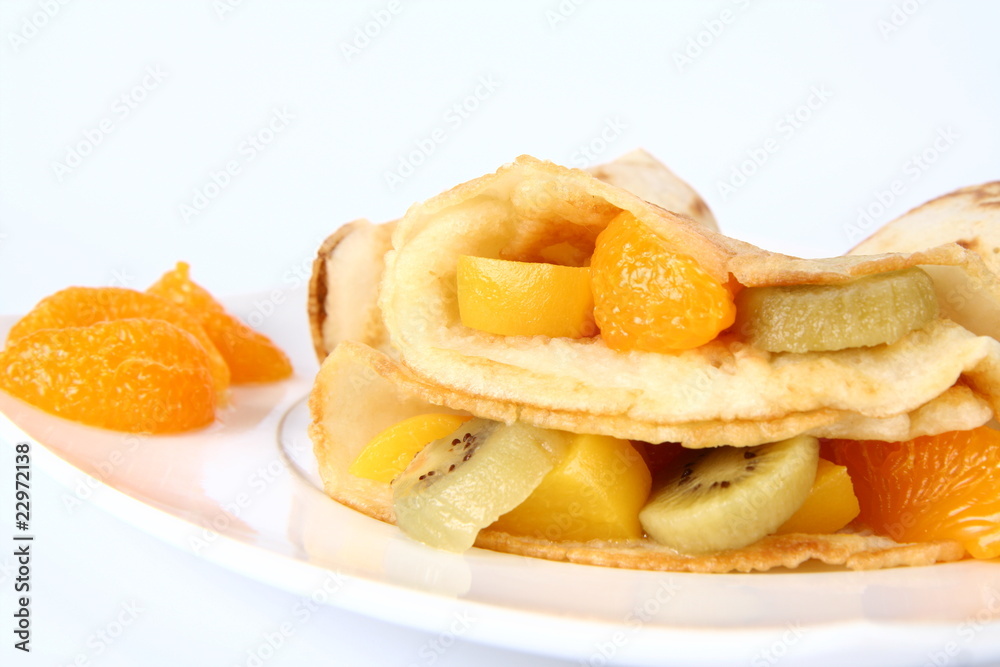Pancakes stuffed with fruit (peach, kiwi, mandarin) Pancakes stuffed with fruit (peach, kiwi, mandarin)