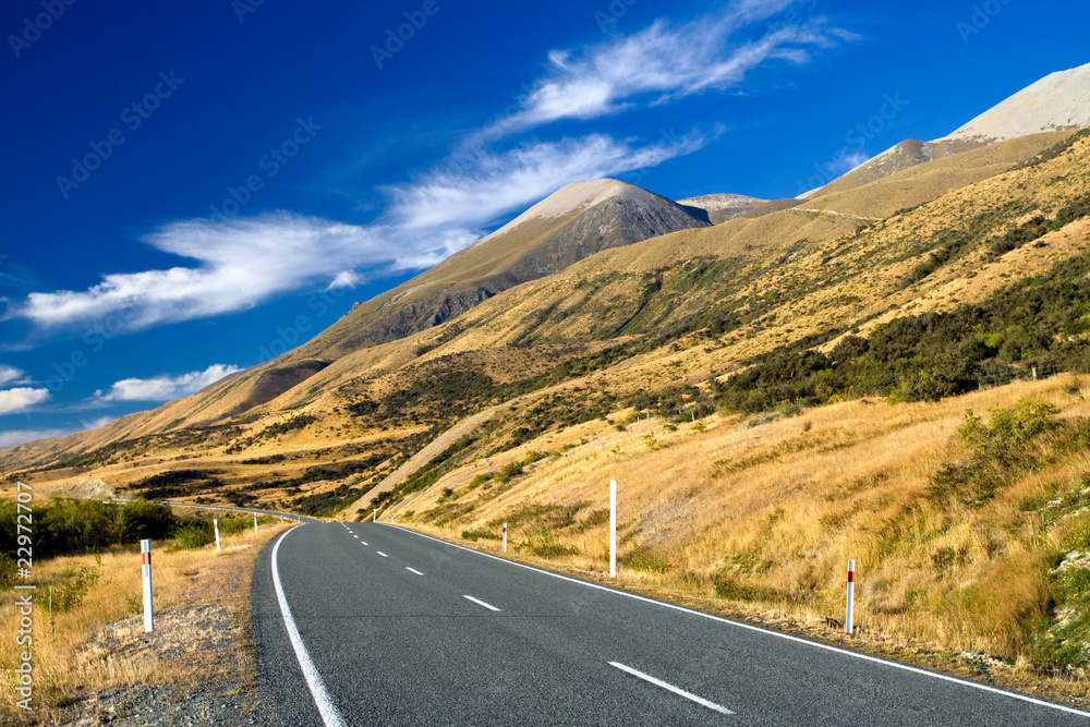 Fototapeta premium mountain road on clear sunny day of autumn