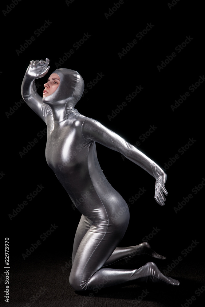 Beautiful girl in futuristic suit