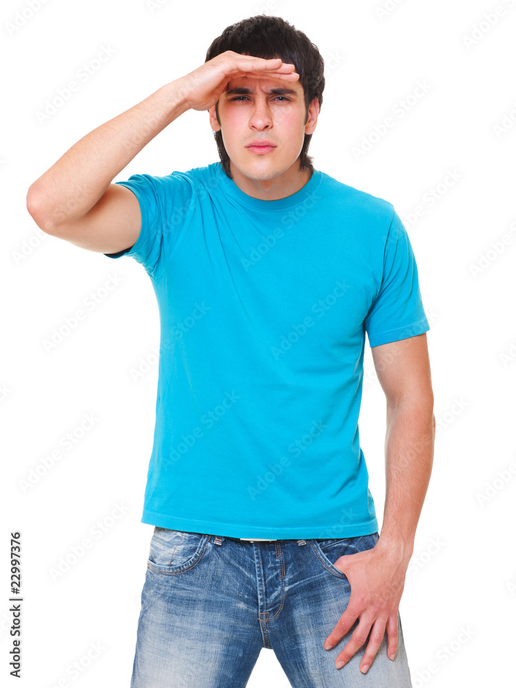 handsome man in blue t-shirt is scrutinizing handsome man in blue t-shirt is scrutinizing