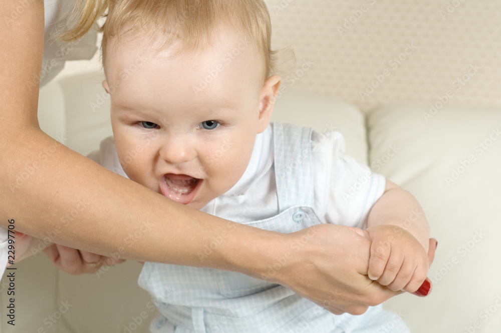 baby wishes to bite mum for a hand baby wishes to bite mum for a hand