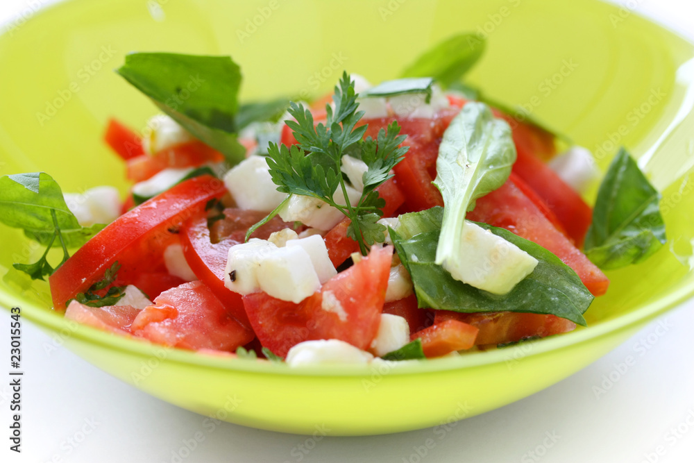Tomato salad with basil and mozzarella Tomato salad with basil and mozzarella