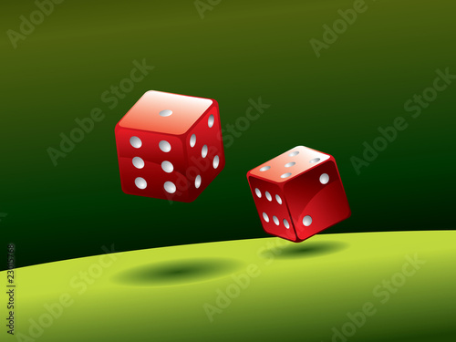 Red dice on green table
