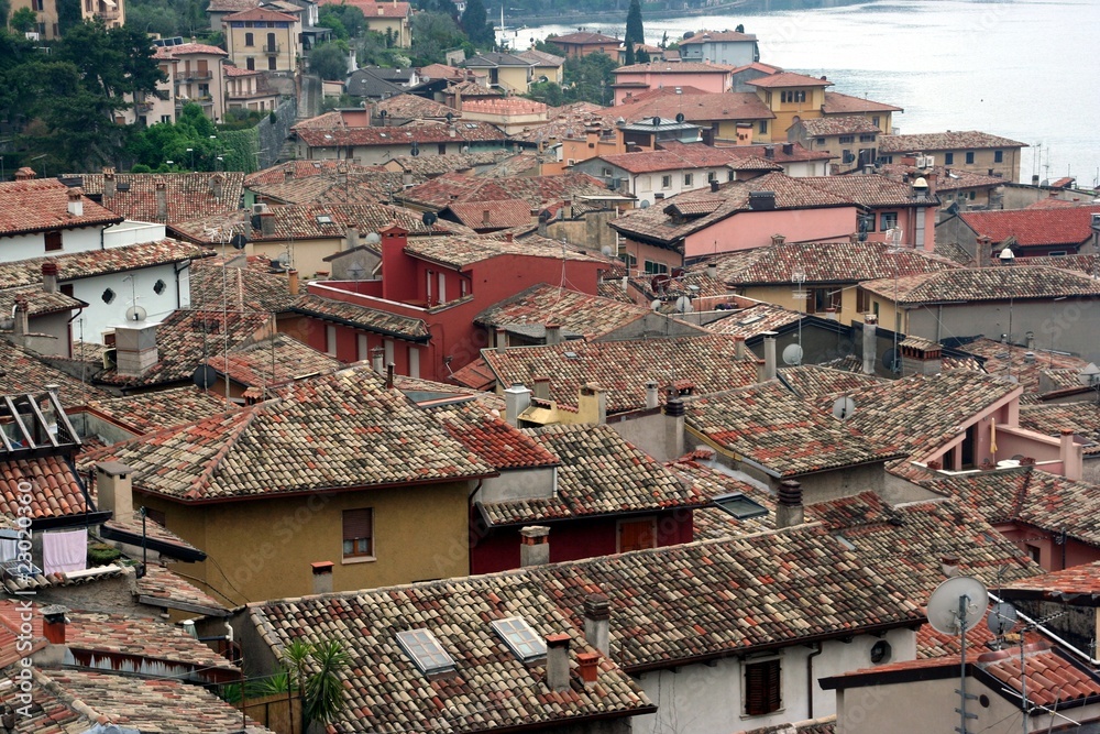 View from height on roofs of italian resort Malcesine View from height on roofs of italian resort Malcesine