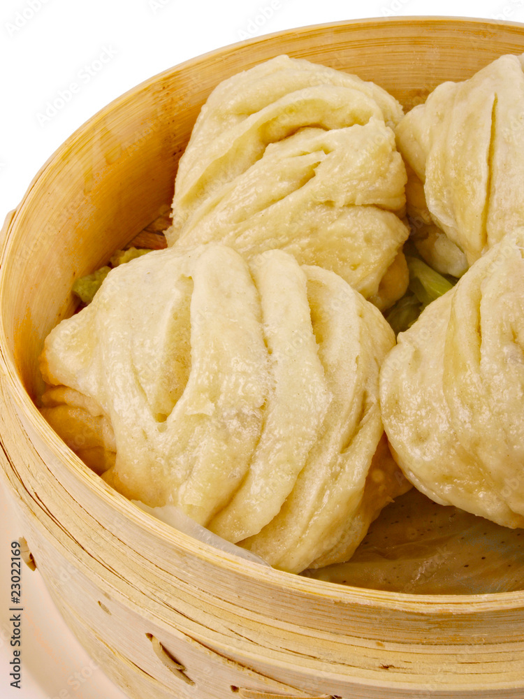 Chinese steamed roll. Close up on white background Chinese steamed roll. Close up on white background